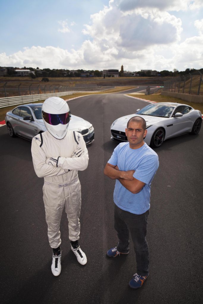Monday 16 May 2016 - Kyalami Racetrack -Johannesburg South Africa - Two of Top Gear’s Magnificent Seven are in South Africa this week. Presenter Chris Harris and The Stig are pictured at Kyalami race track ahead of Top Gear Series 23’s premiere on BBC Brit on Wednesday June 1st at 8pm, DStv Channel 120. A welcoming committee including comedian Jason Goliath and motoring enthusiast DJ Warras had the opportunity to lap the track with The Stig and Harris. The Stig was, as usual, a man of few words…none at all to be exact, but gave them a ride they won’t forget. Pictured here, The Stig and Chris Harris. Picture: Thys Dullaart
